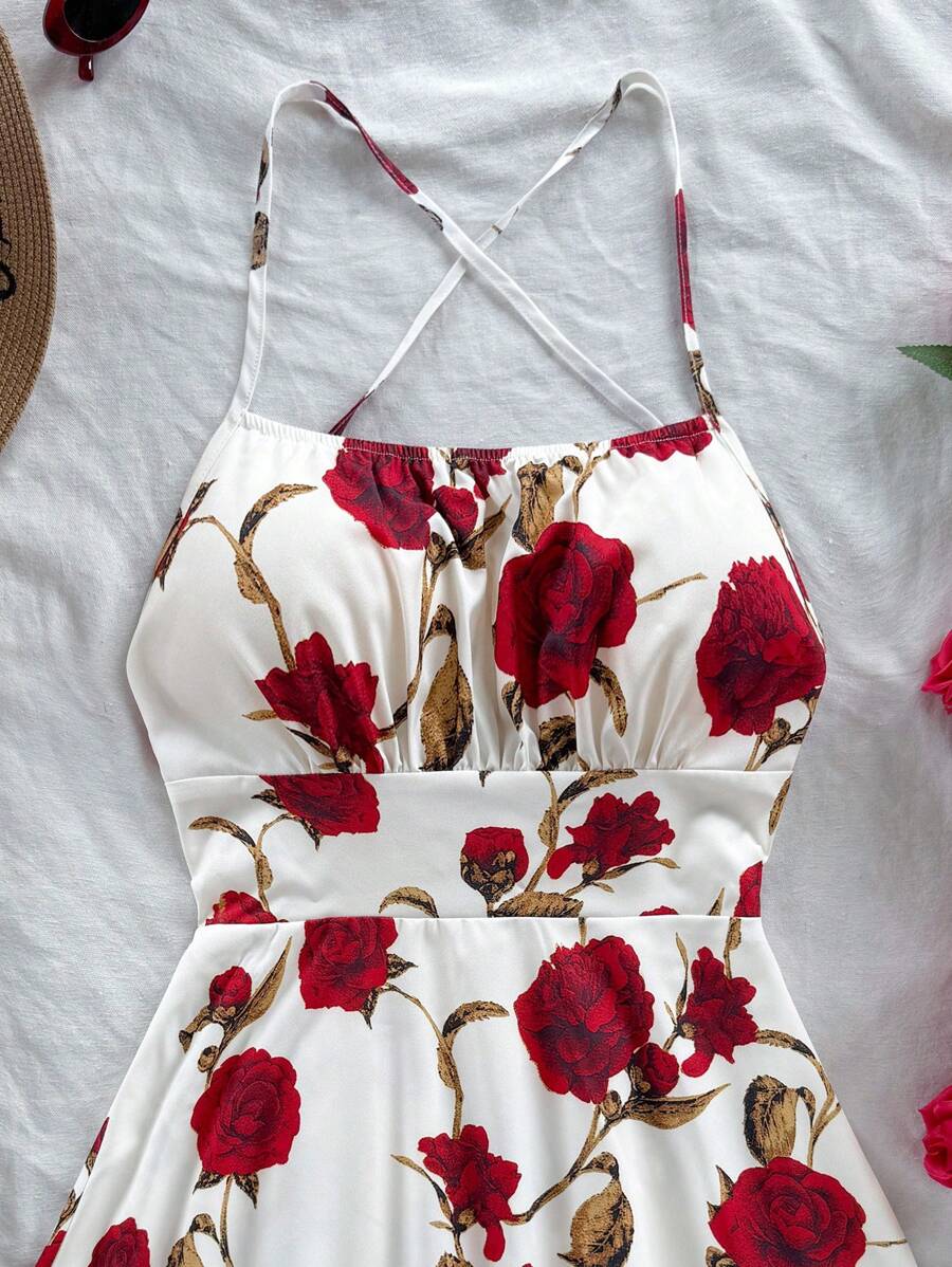 Soleia spaghetti strap mini dress with an open back and a romantic red floral print