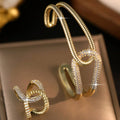SHEIN 2pcs Twisted Cubic Zirconia Bracelet Ring Set