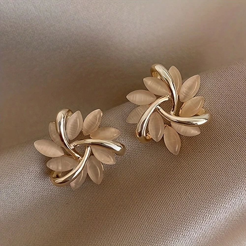 SHEIN Rotating Flower Cat Eye Sun Stud Earrings