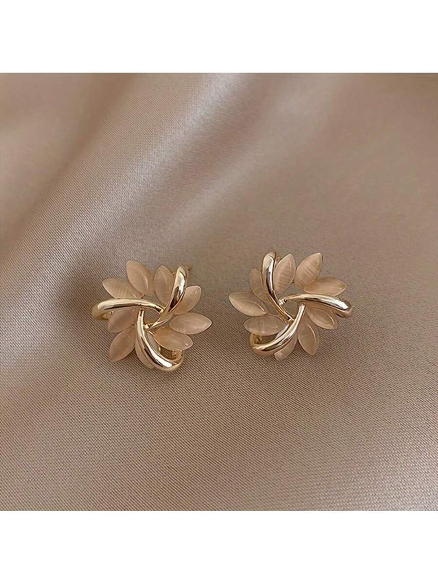 SHEIN Rotating Flower Cat Eye Sun Stud Earrings
