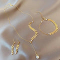 GOLD 4-piece faux pearl embellishment jewelry set