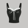 SHEIN DAZY توب كروب نسائي أسود بقصة ضيقة (Slim Fit) من قماش مطاطي مع تفاصيل شبكية ورقبة هالتر.